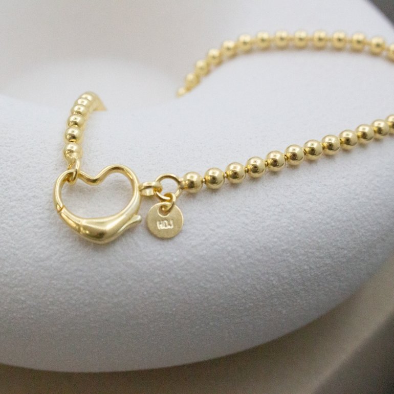 HOJB Ball Bracelet with Heart Clasp Gold on Silver